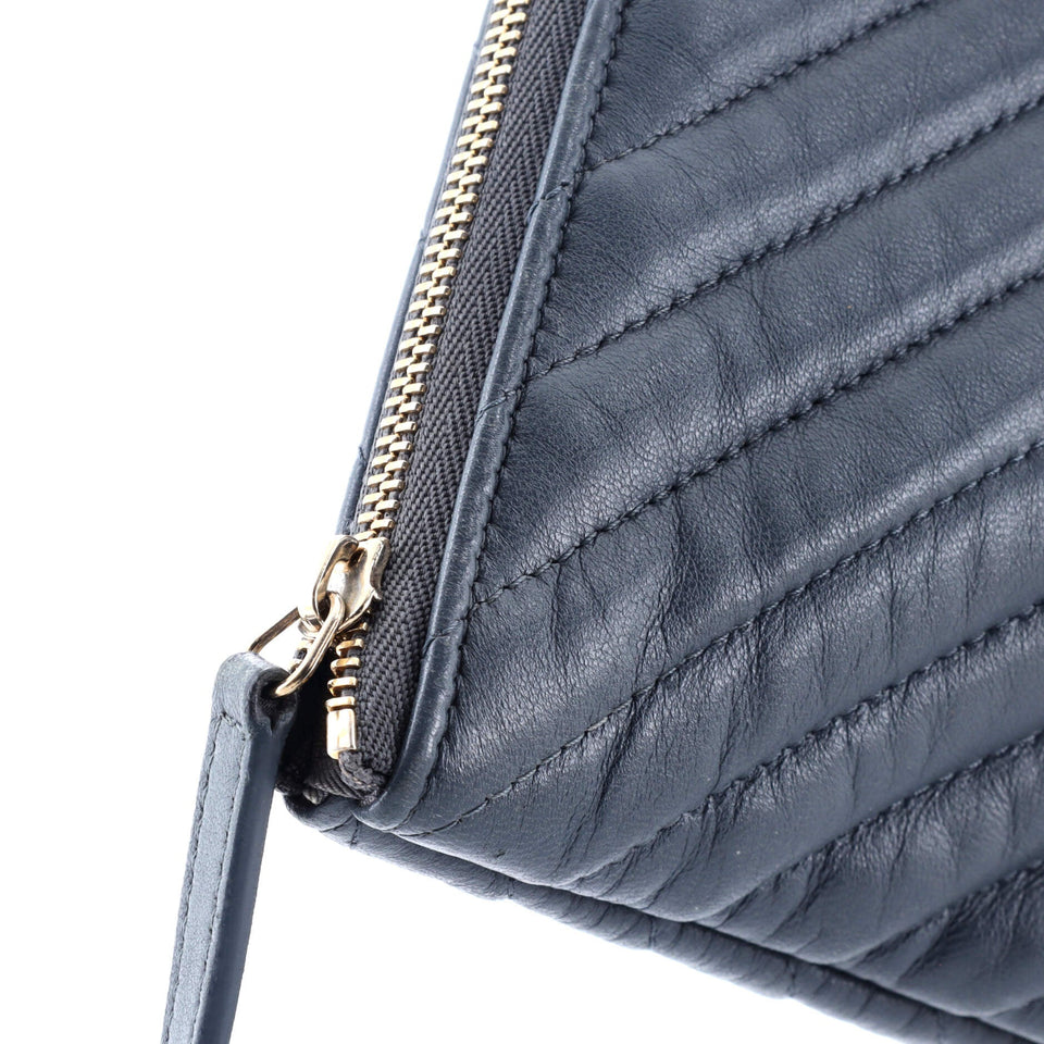 O Case Clutch Chevron Lambskin Medium