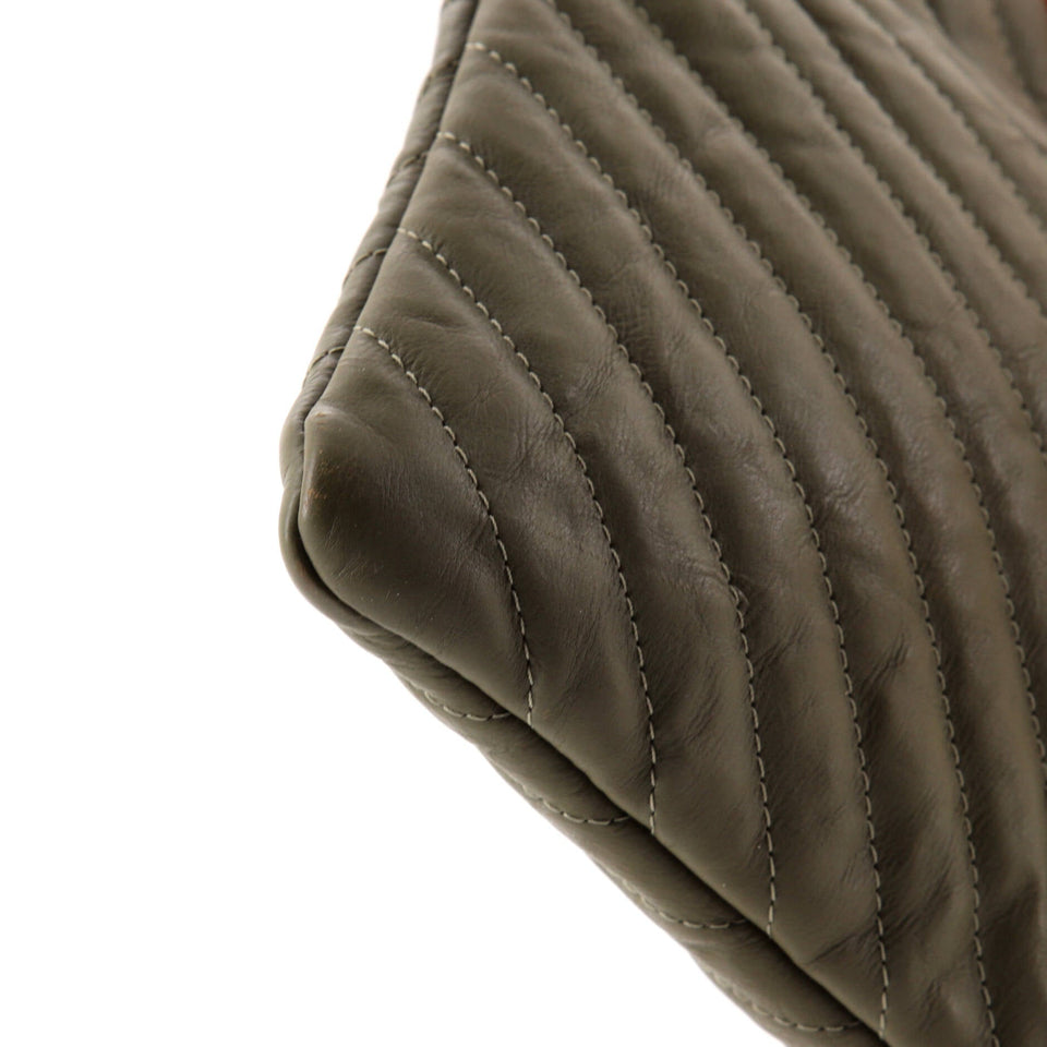 O Case Clutch Chevron Lambskin Medium