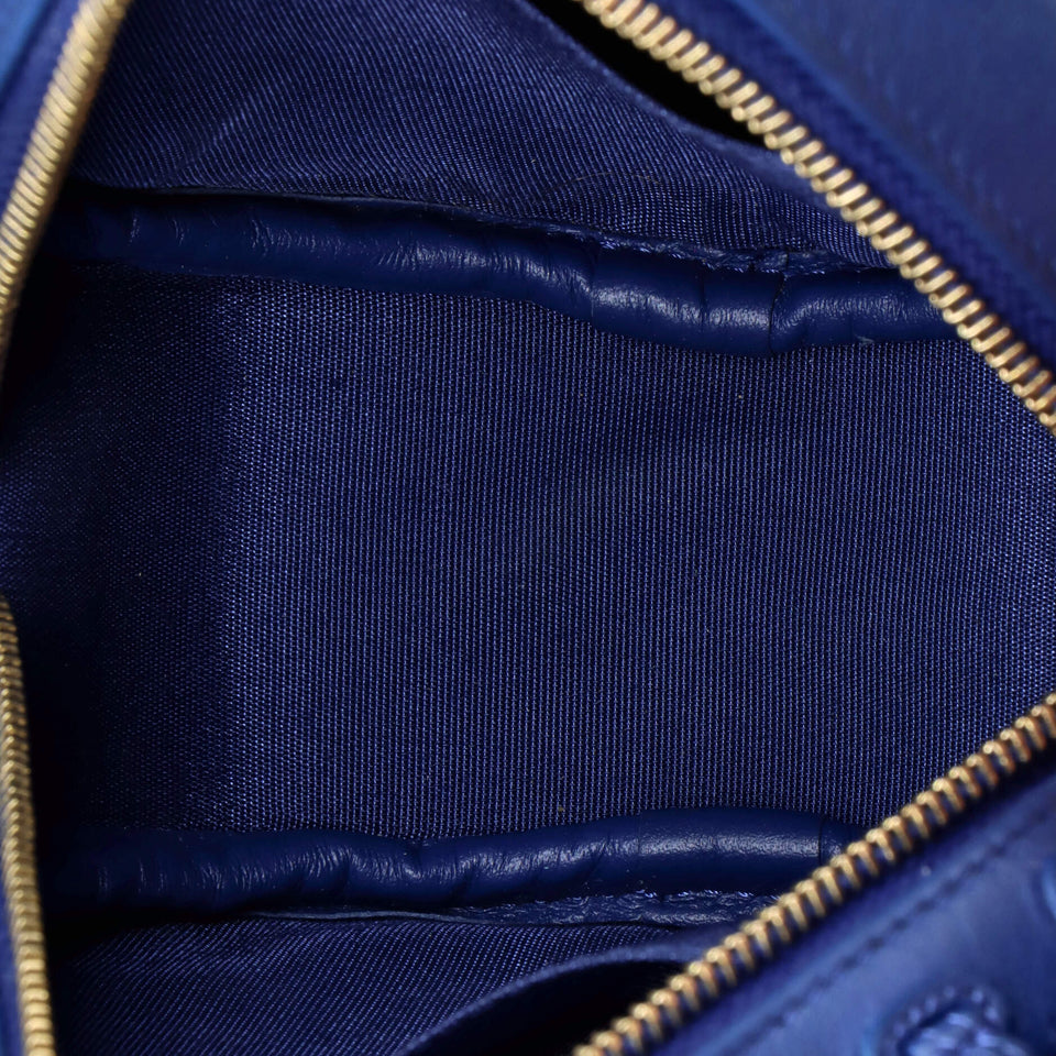19 Round Clutch with Chain Quilted Shearling