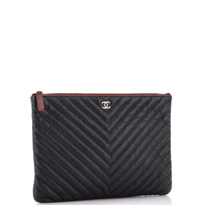 O Case Clutch Chevron Caviar Medium