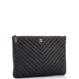 O Case Clutch Chevron Caviar Medium