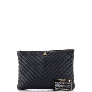 O Case Clutch Chevron Caviar Medium