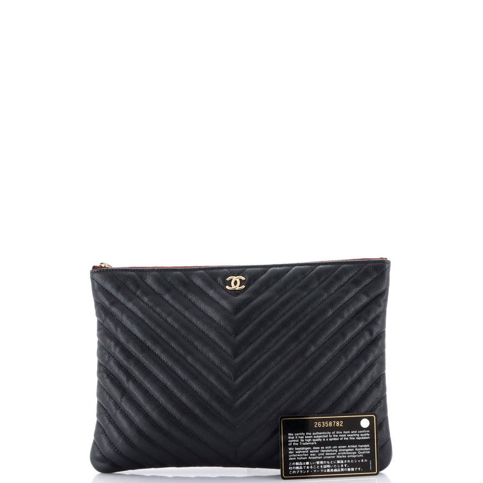 O Case Clutch Chevron Caviar Medium