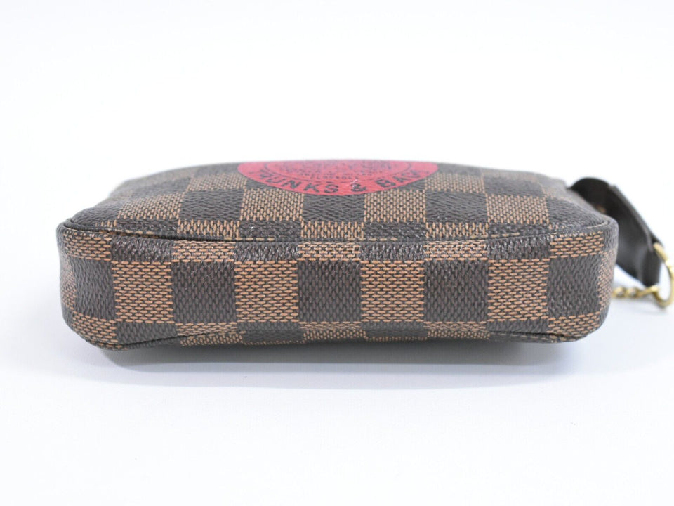 Louis Vuitton Mini Pochette Accessoires  Calfskin Clutch Bag