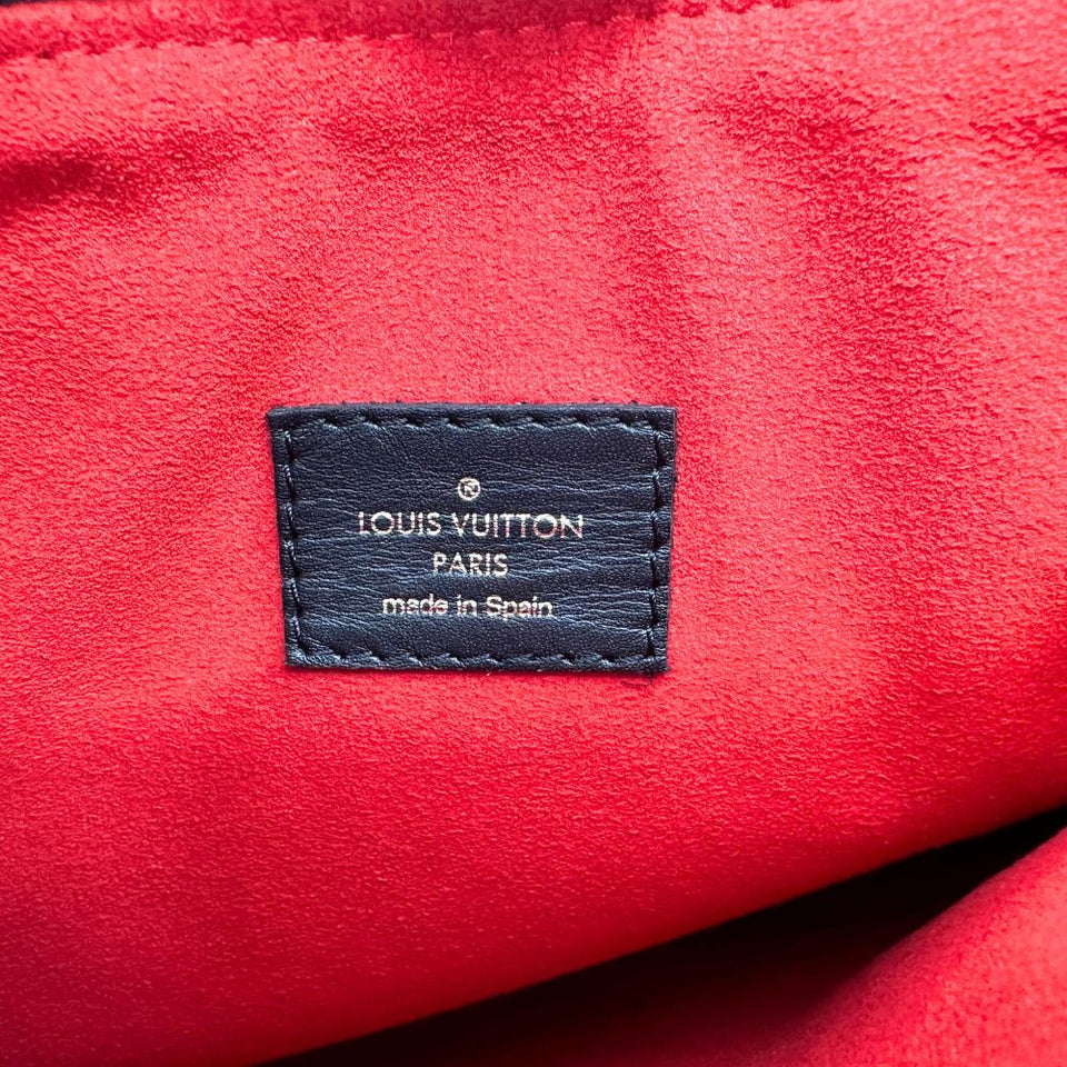 Louis Vuitton Tuileries  Canvas Clutch Bag