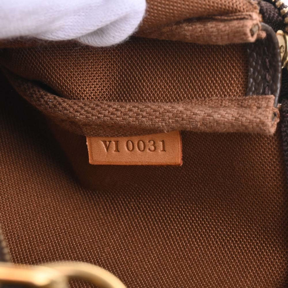 Louis Vuitton Pochette Accessoires  Canvas Clutch Bag