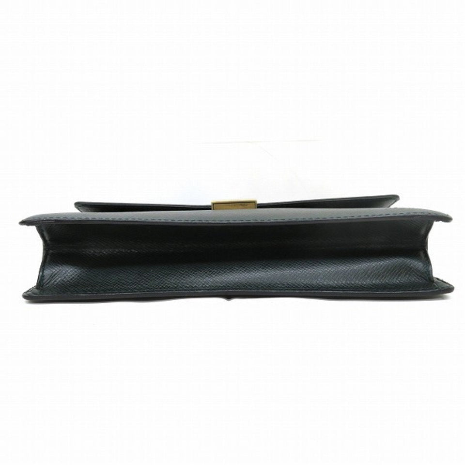 Louis Vuitton Selenga  Leather Clutch Bag