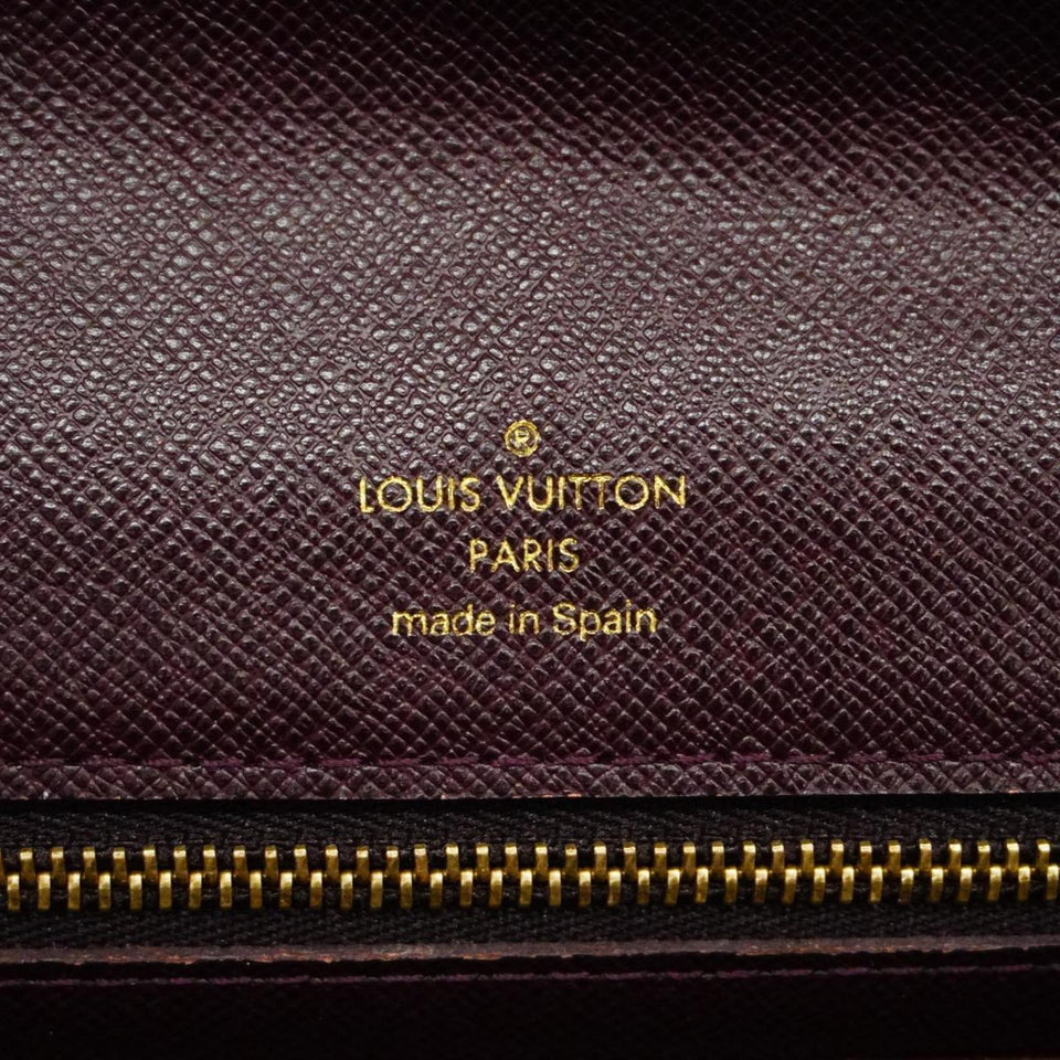 Louis Vuitton Selenga  Leather Clutch Bag