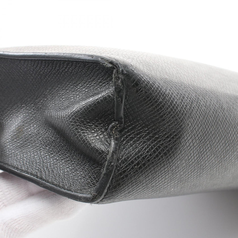 Louis Vuitton Taiga Pochette Voyage MM  Leather Clutch Bag