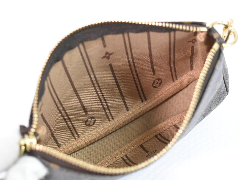 Louis Vuitton Mini Pochette Accessoires  Canvas Clutch Bag
