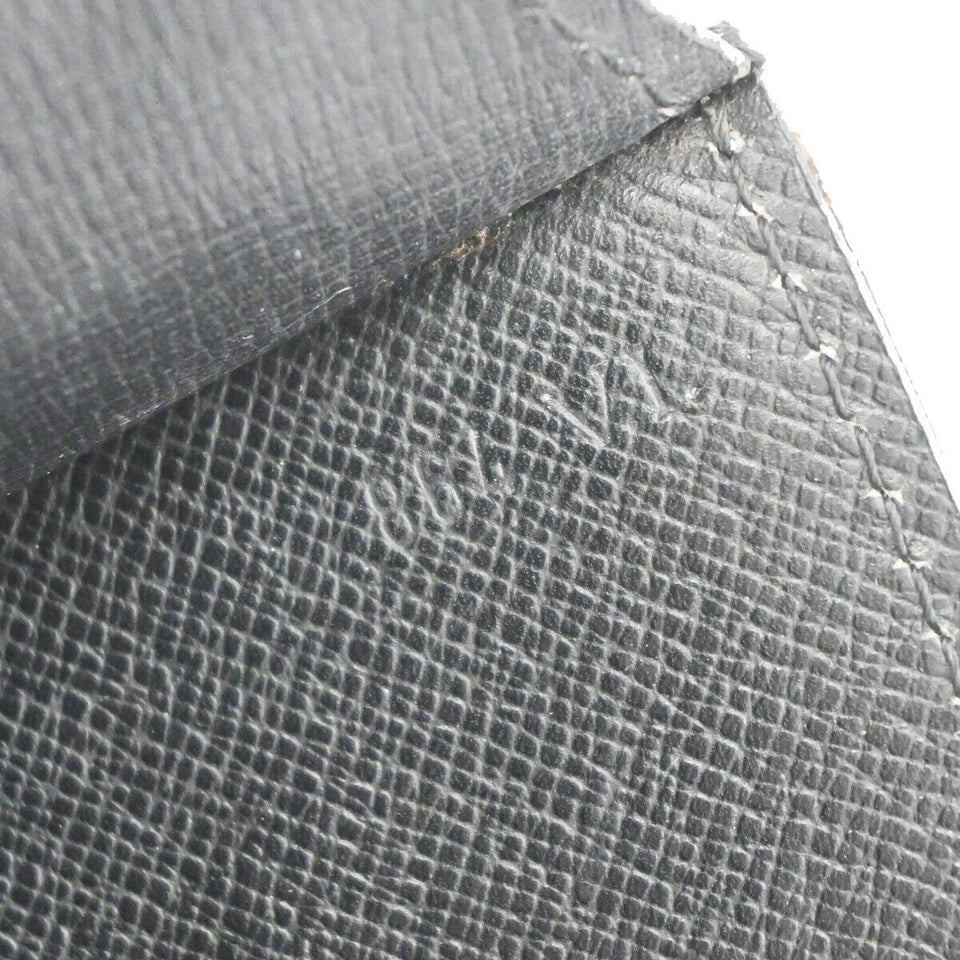Louis Vuitton Montaigne  Leather Clutch Bag