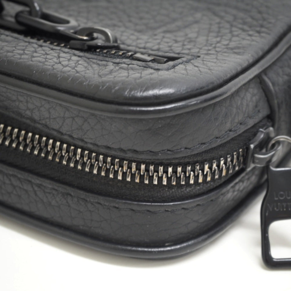 Louis Vuitton Volga  Leather Clutch Bag