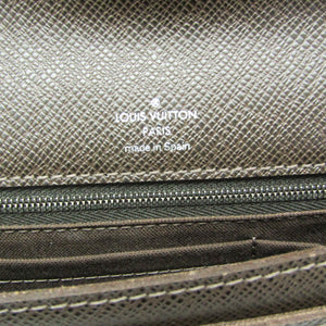 Louis Vuitton Belaia  Leather Clutch Bag