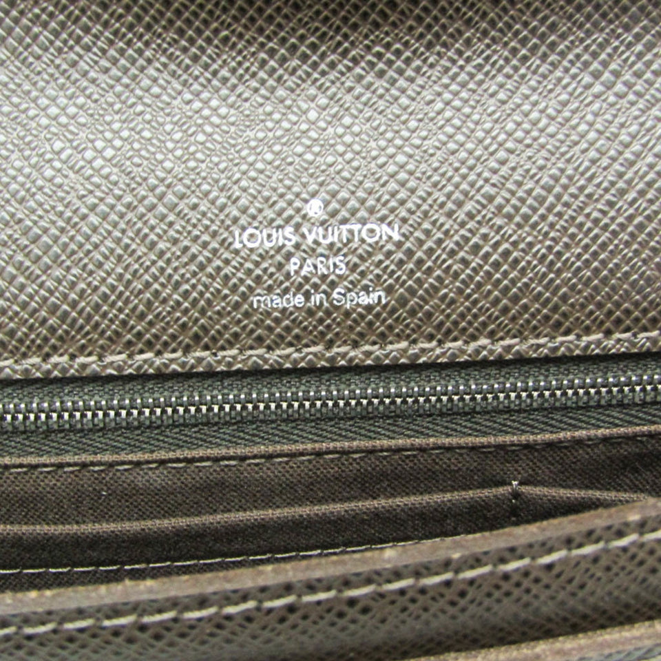 Louis Vuitton Belaia  Leather Clutch Bag