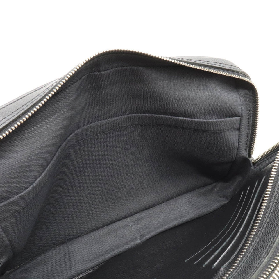 Louis Vuitton Pavel  Leather Clutch Bag