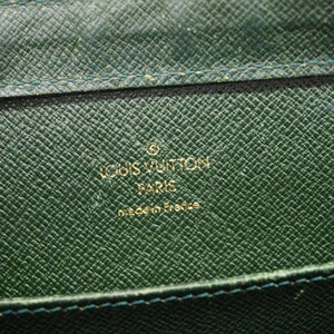 Louis Vuitton Taiga  Leather Clutch Bag