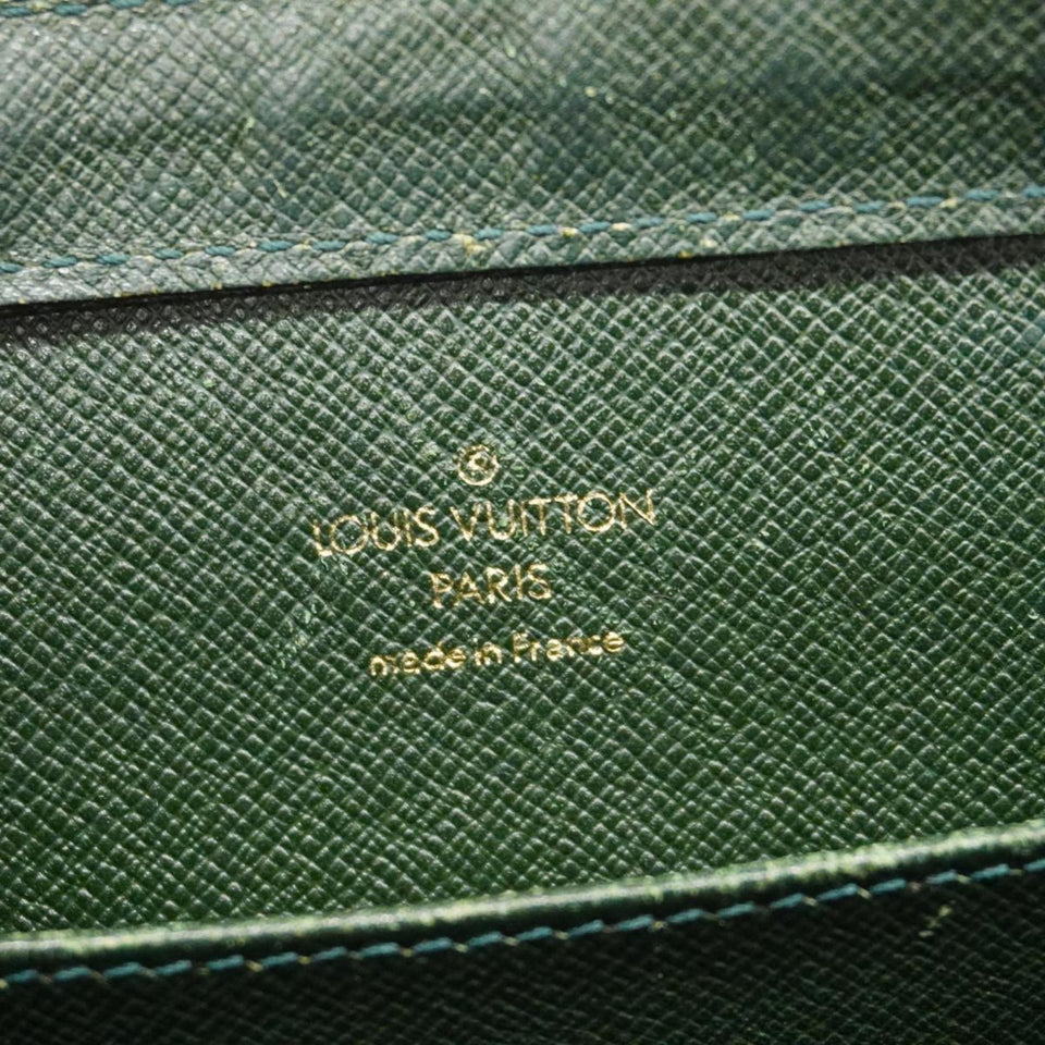 Louis Vuitton Taiga  Leather Clutch Bag
