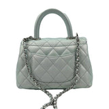 CHANEL Coco Extra Mini Top Handle Iridescent Caviar Leather Crossbody Bag Light Blue