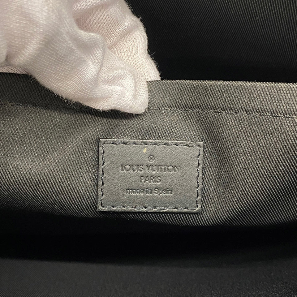 Louis Vuitton Discovery  Leather Clutch Bag