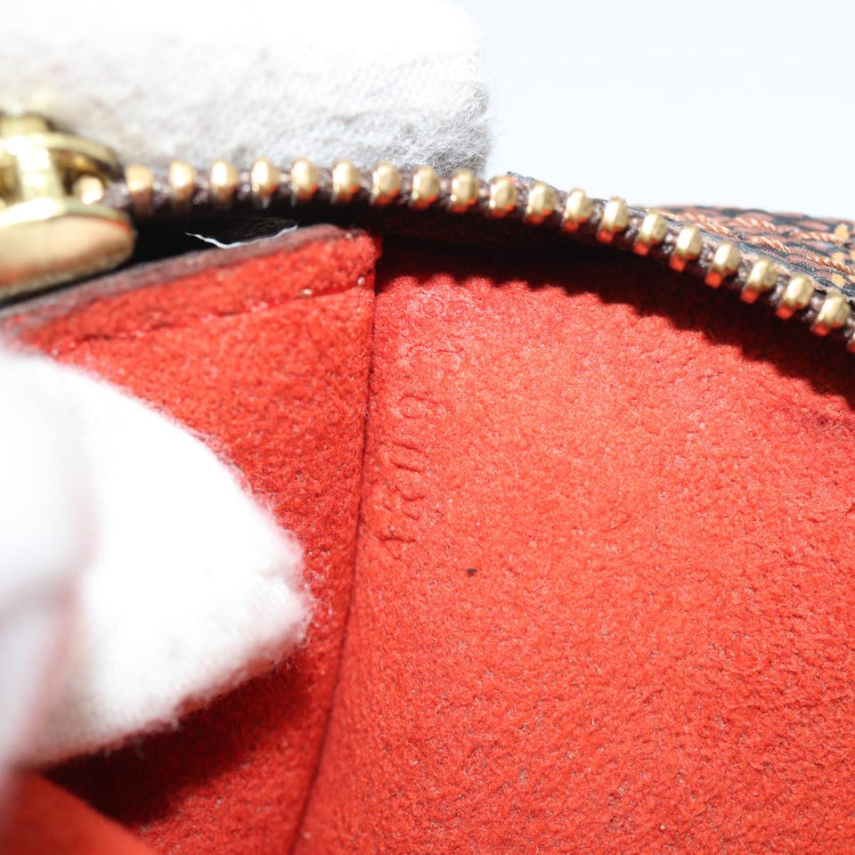 Louis Vuitton Marais Clutch Bag