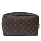 Louis Vuitton Trousse De Toilette  Canvas Clutch Bag