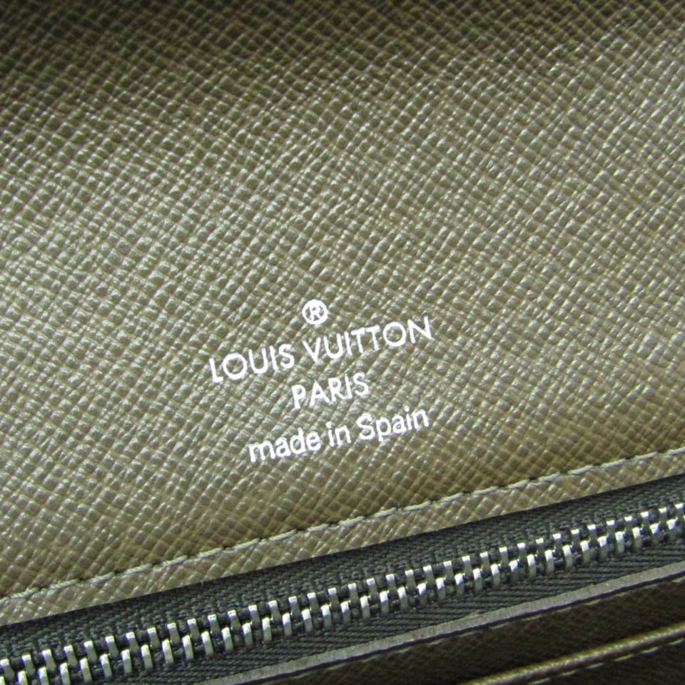 Louis Vuitton Selenga  Leather Clutch Bag
