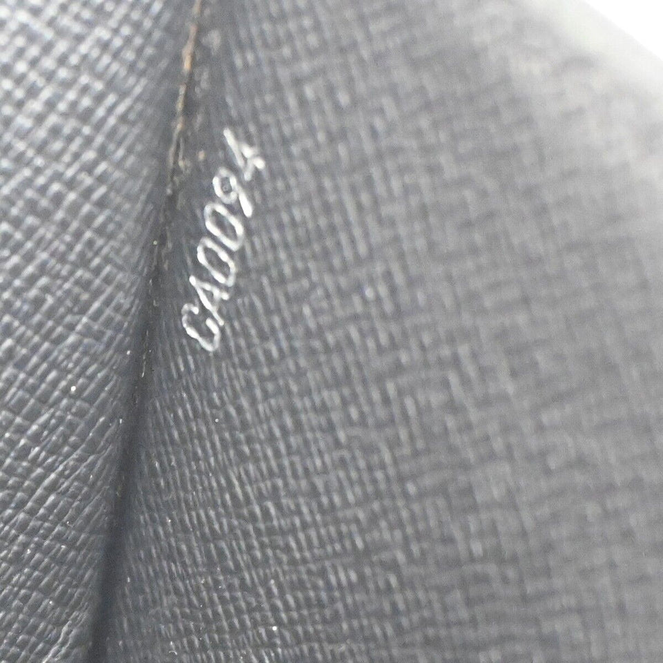 Louis Vuitton Selenga  Leather Clutch Bag