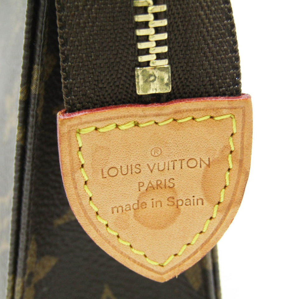 Louis Vuitton Trousse De Toilette  Canvas Clutch Bag