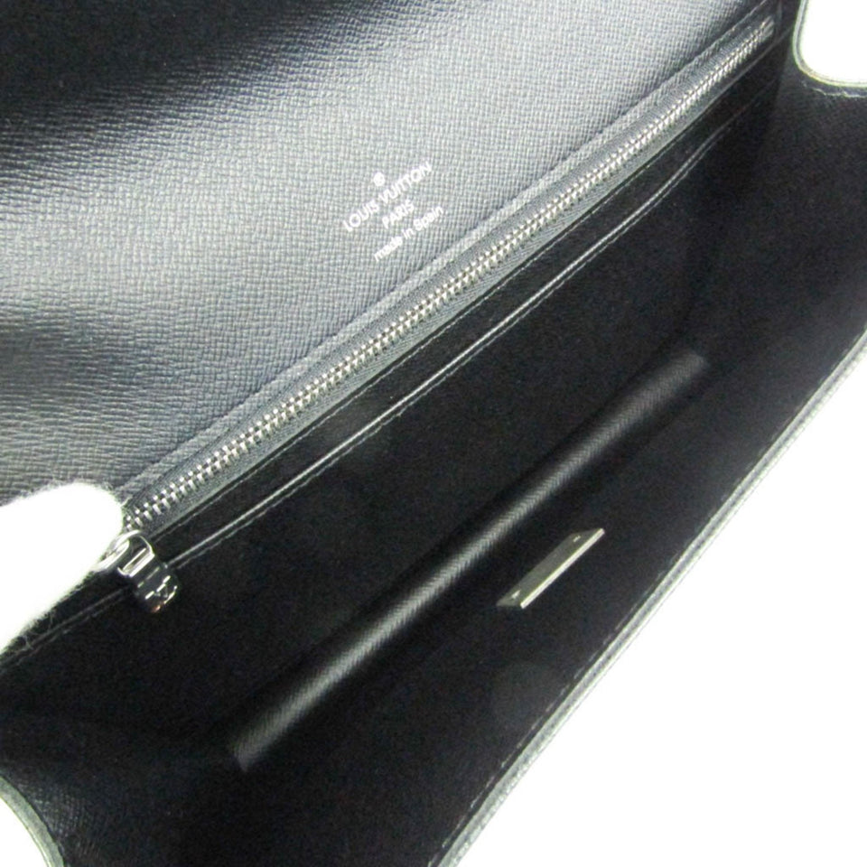 Louis Vuitton Selenga  Leather Clutch Bag