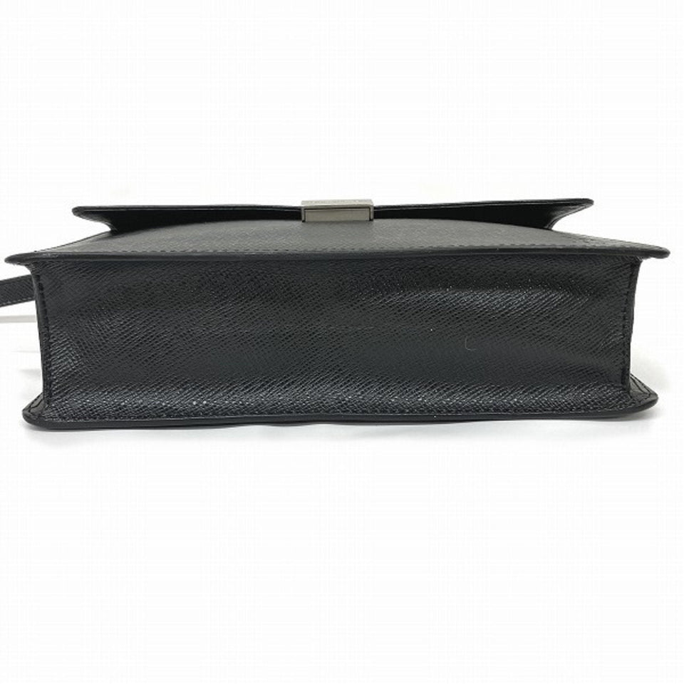 Louis Vuitton Selenga  Leather Clutch Bag