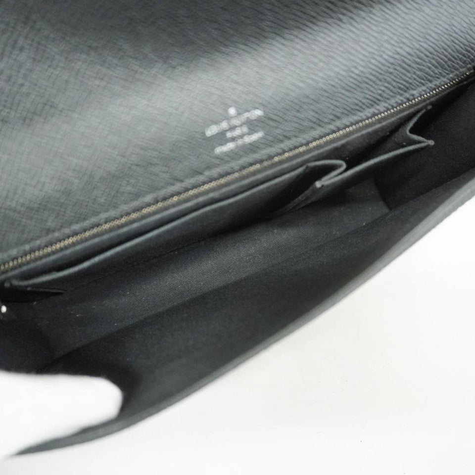 Louis Vuitton Belaia  Leather Clutch Bag