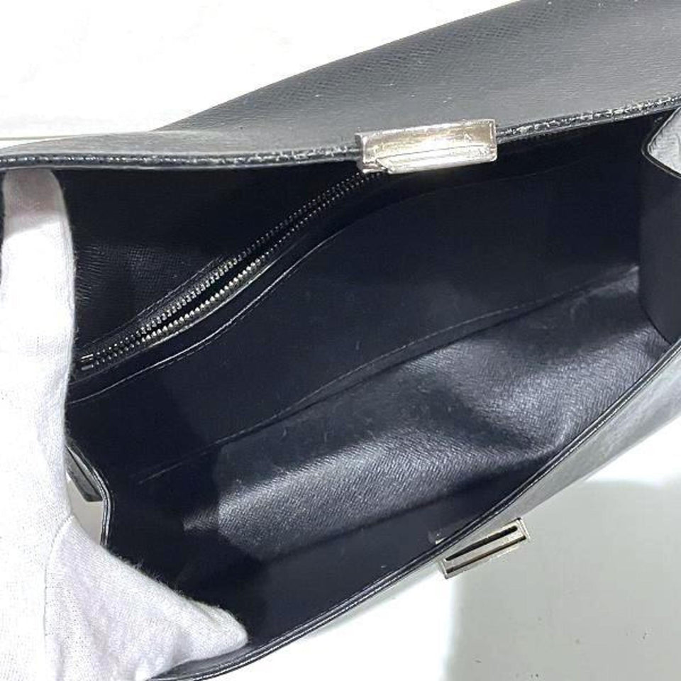 Louis Vuitton Selenga  Leather Clutch Bag