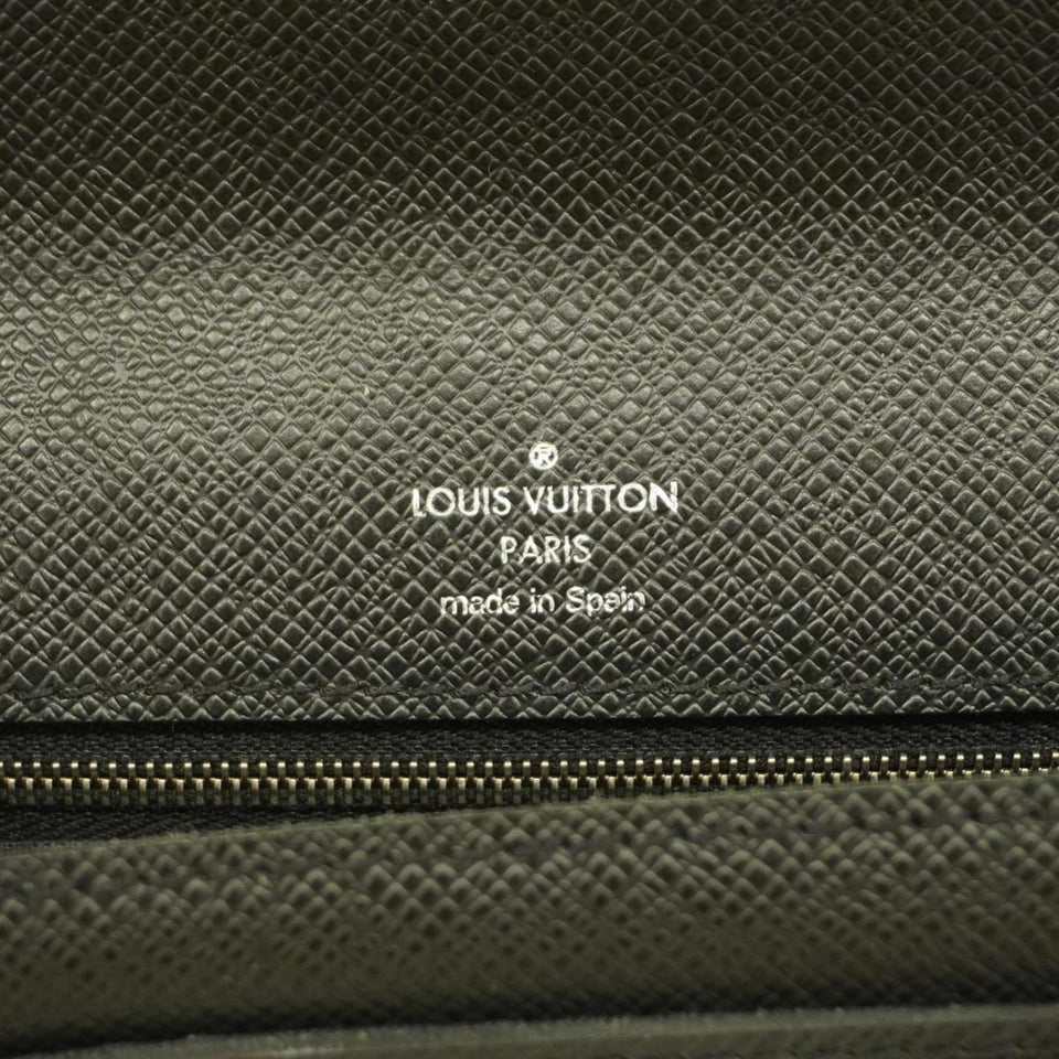 Louis Vuitton Belaia  Leather Clutch Bag