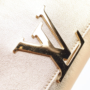 Louis Vuitton  Gold Leather Louise Clutch