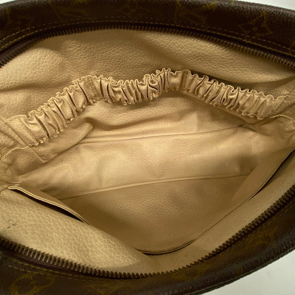 Louis Vuitton Trousse De Toilette  Canvas Clutch Bag