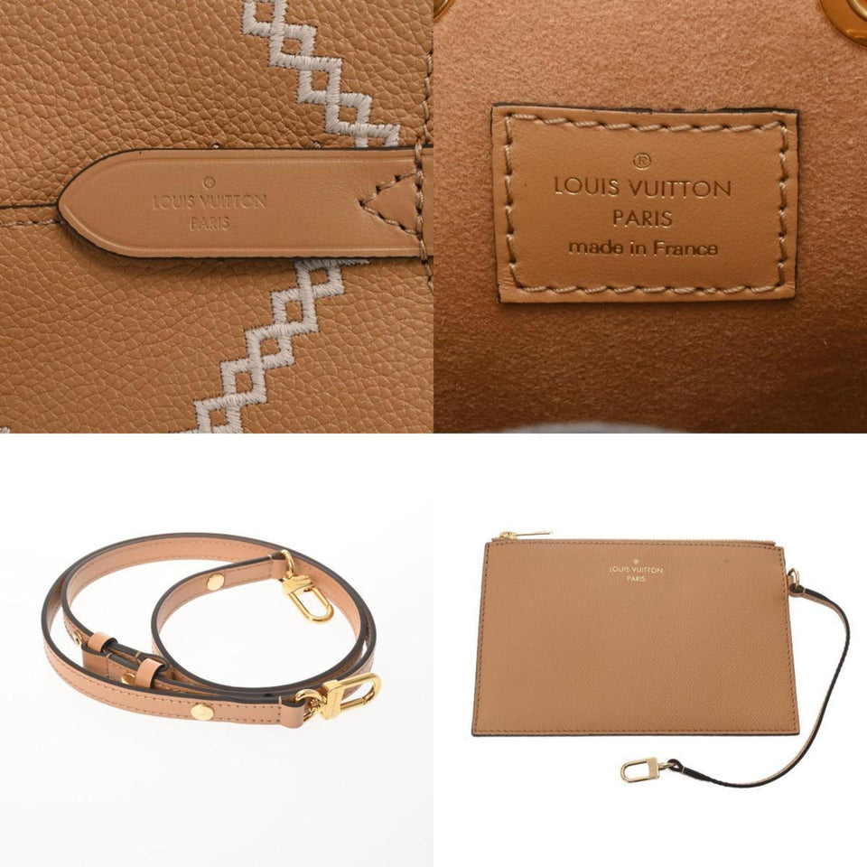 Louis Vuitton Néonoé  Leather Clutch Bag