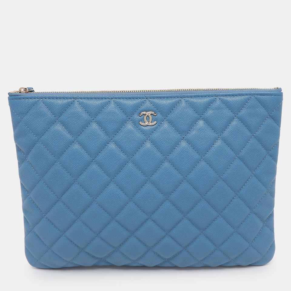 Blue Quilted Caviar Leather O Case Clutch