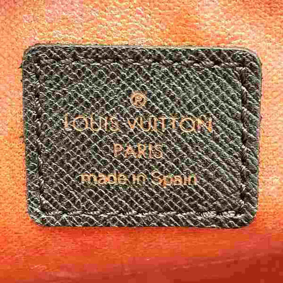Louis Vuitton Trousse De Toilette  Canvas Clutch Bag