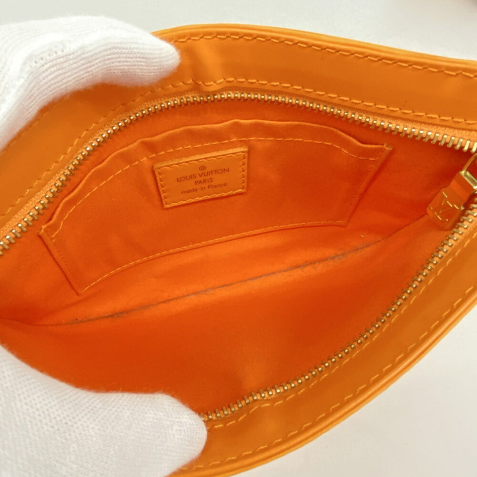 Louis Vuitton Sarvanga  Leather Clutch Bag
