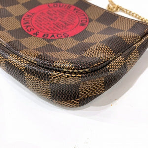 Louis Vuitton Mini Pochette Accessoires  Canvas Clutch Bag