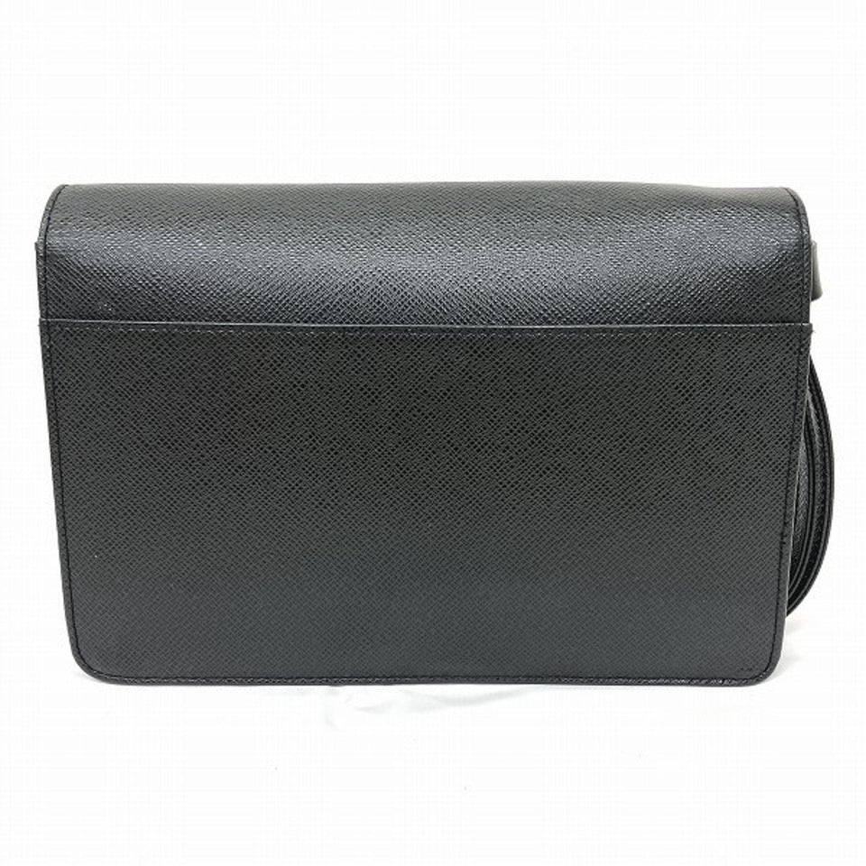 Louis Vuitton Selenga  Leather Clutch Bag