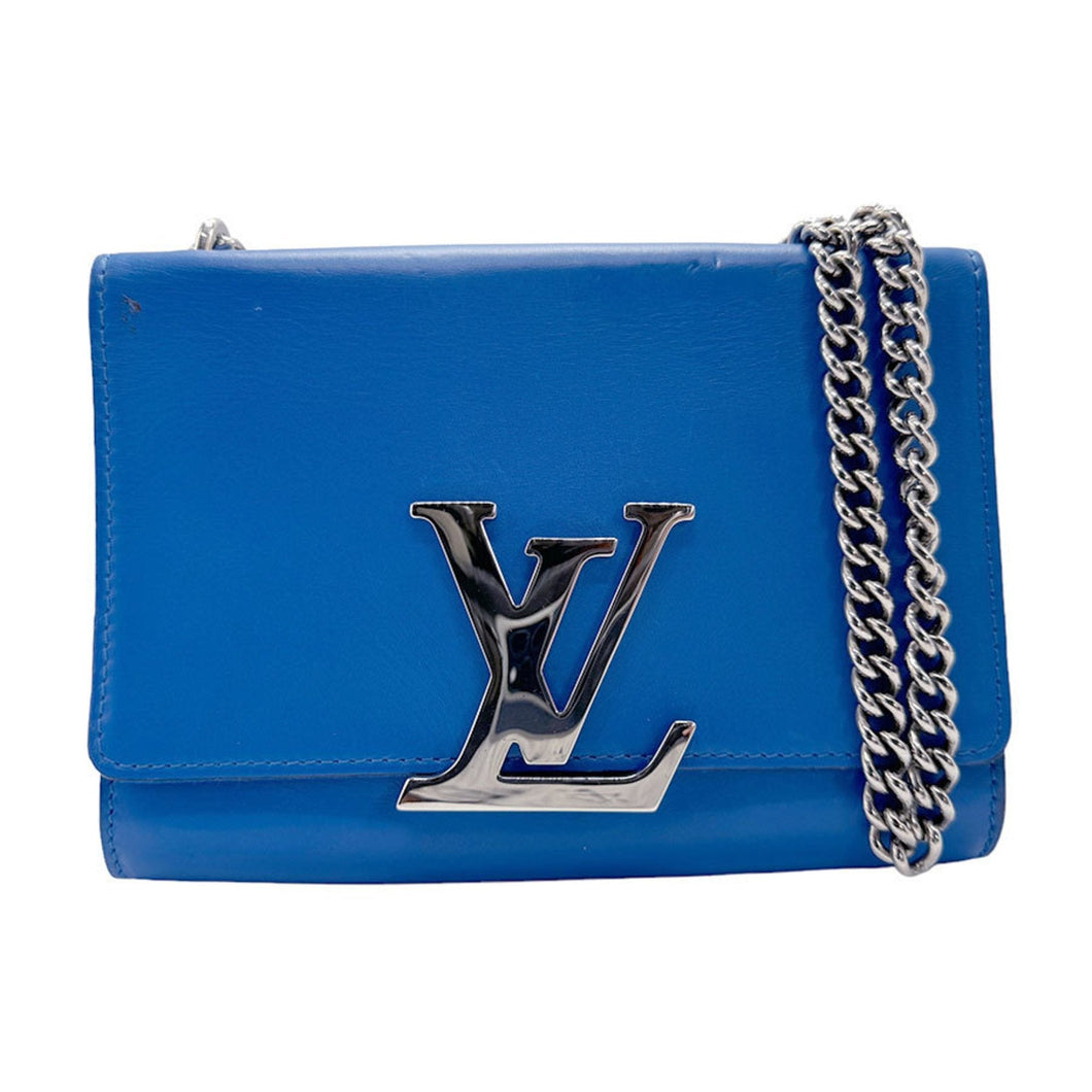 Louis Vuitton Louise  Leather Clutch Bag