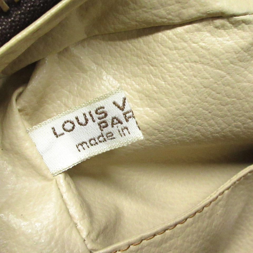 Louis Vuitton Trousse De Toilette  Canvas Clutch Bag