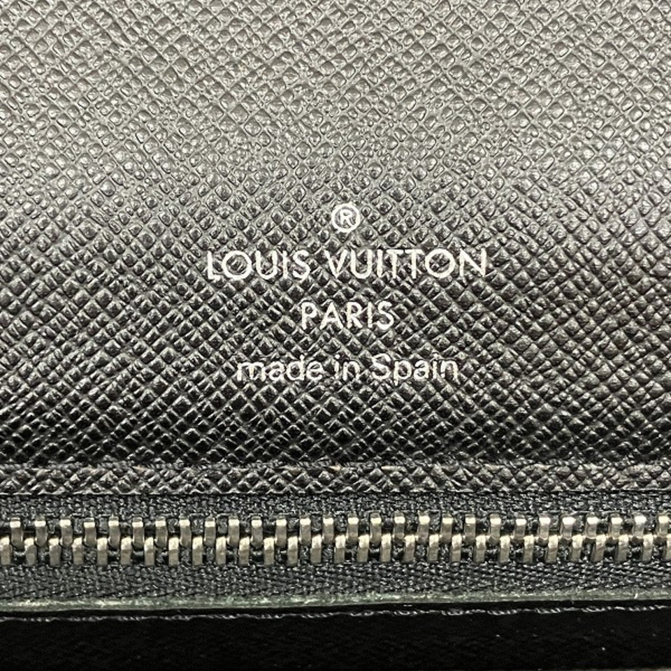 Louis Vuitton Selenga  Leather Clutch Bag