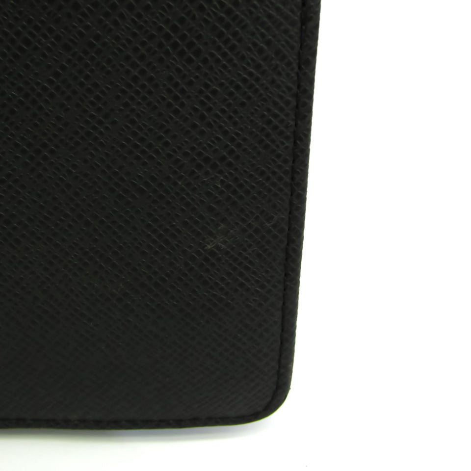 Louis Vuitton Selenga Leather Clutch Bag