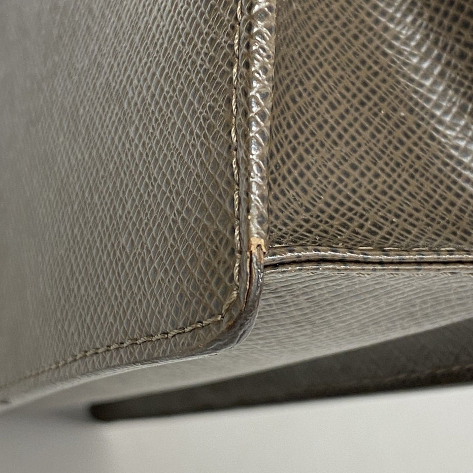 Louis Vuitton Selenga  Leather Clutch Bag