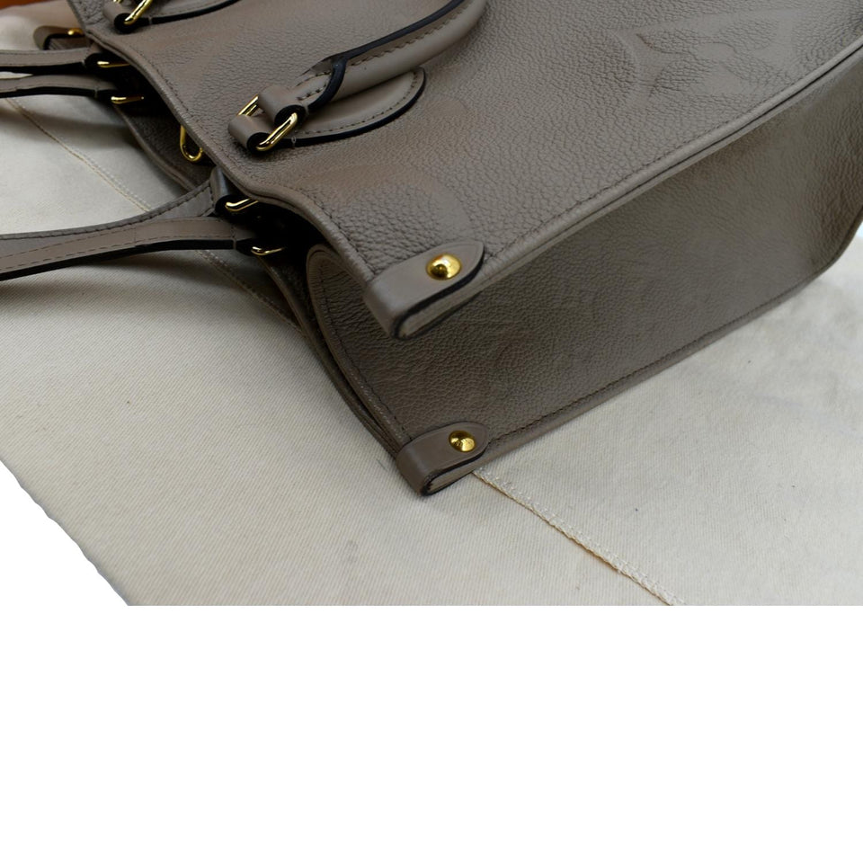 LOUIS VUITTON Onthego MM Monogram Empreinte Shoulder Bag Tourterelle