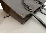 LOUIS VUITTON Onthego MM Monogram Empreinte Shoulder Bag Tourterelle