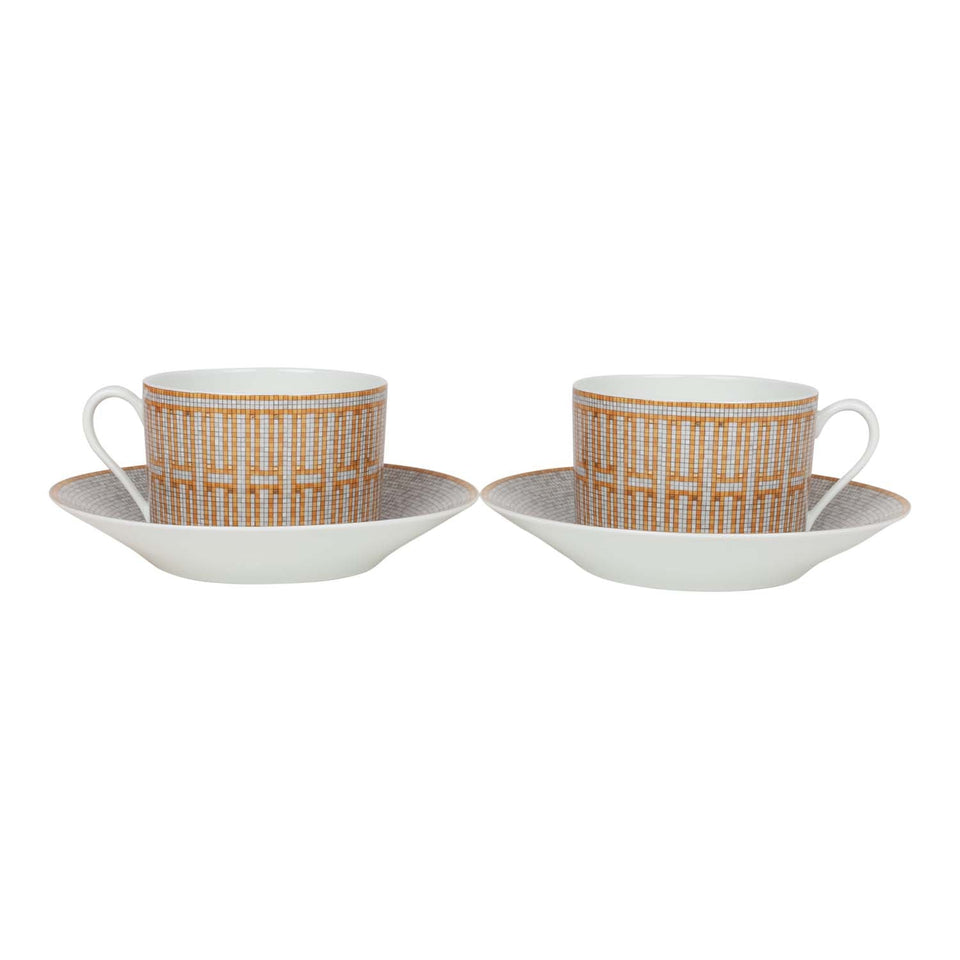Hermes "Mosaique Au 24" Gold Porcelain Tea Cup And Saucer Set