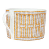 Hermes "Mosaique Au 24" Gold Porcelain Tea Cup And Saucer Set
